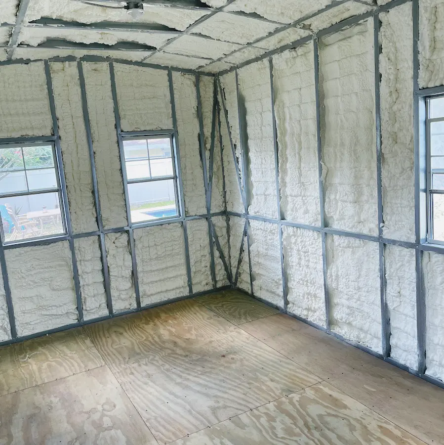 Closed-cell spray foam insulation applied to wall cavities in a residential project in Glenwood